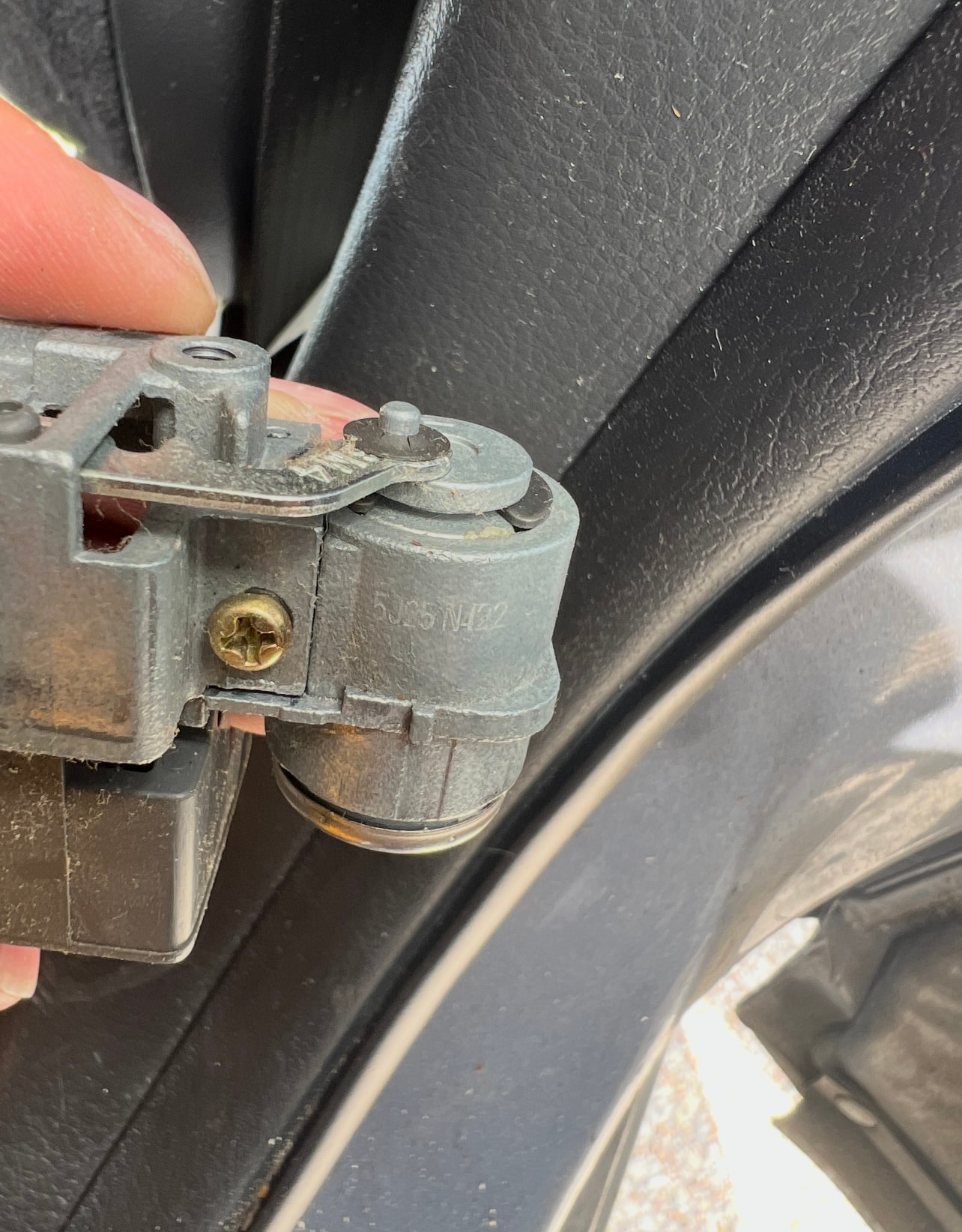 Car door latch mechanism close-up
